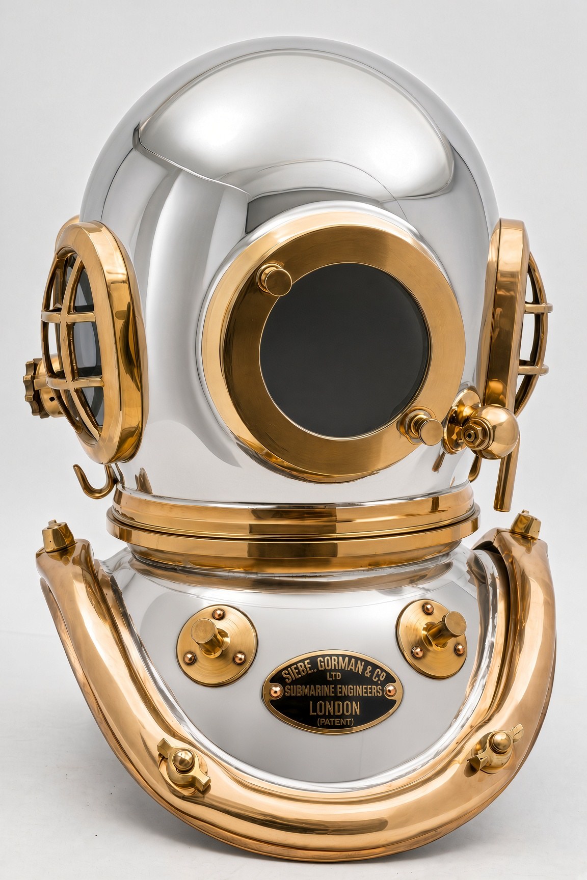 Miniature diving helmet in the Siebe Gorman pattern, in sterling silver with gold-finished bonnet, corselet and fittings